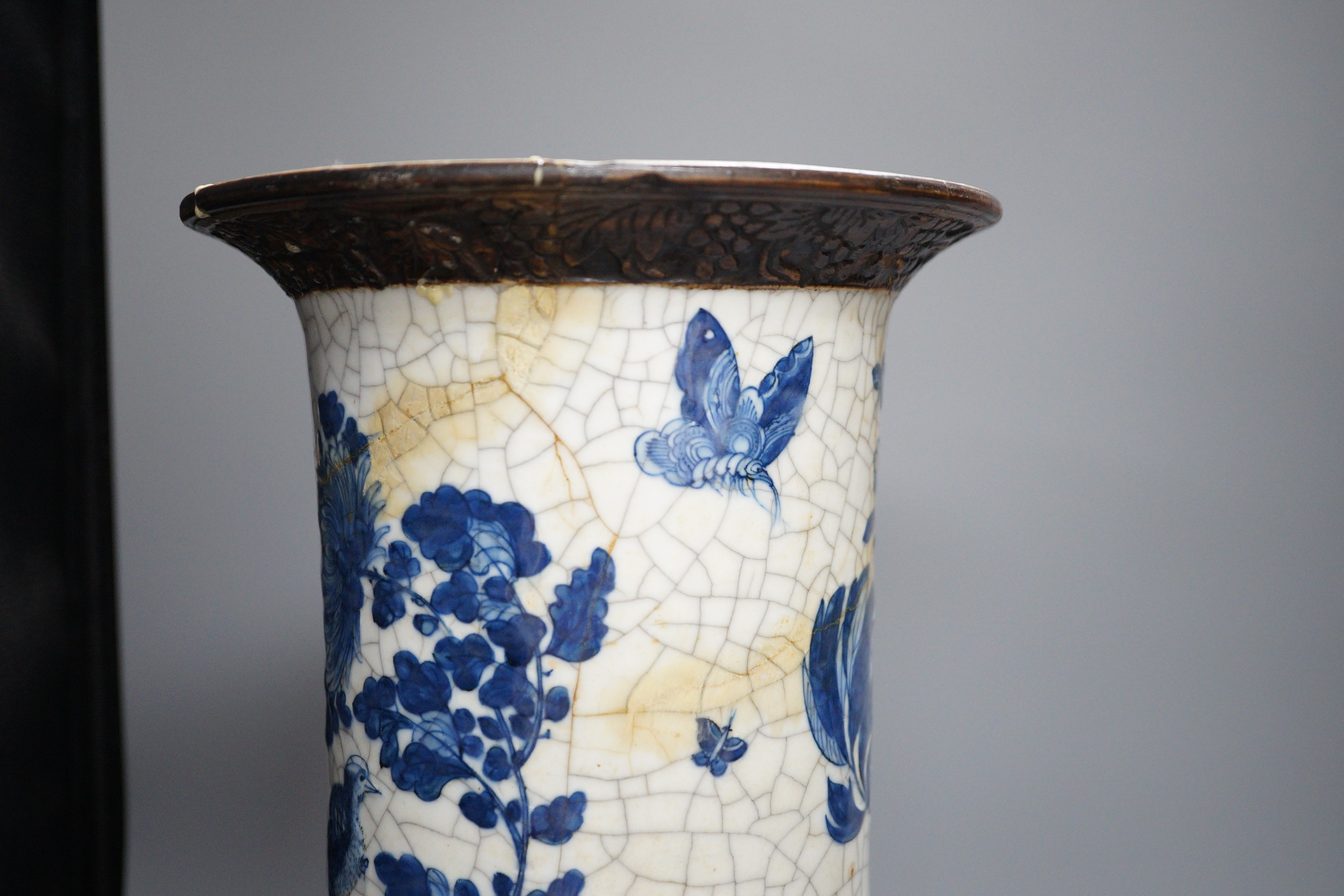 A large Chinese blue and white crackle glaze vase, a sang de boeuf vase and a monochrome jar, tallest 40cm